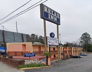 Man Found Dead Sitting in Car with Drugs at Local Motel