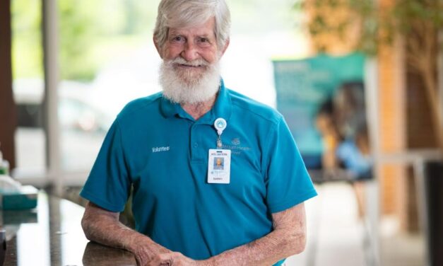 Cancer Survivor Rings in Hope and Returns to Give Back
